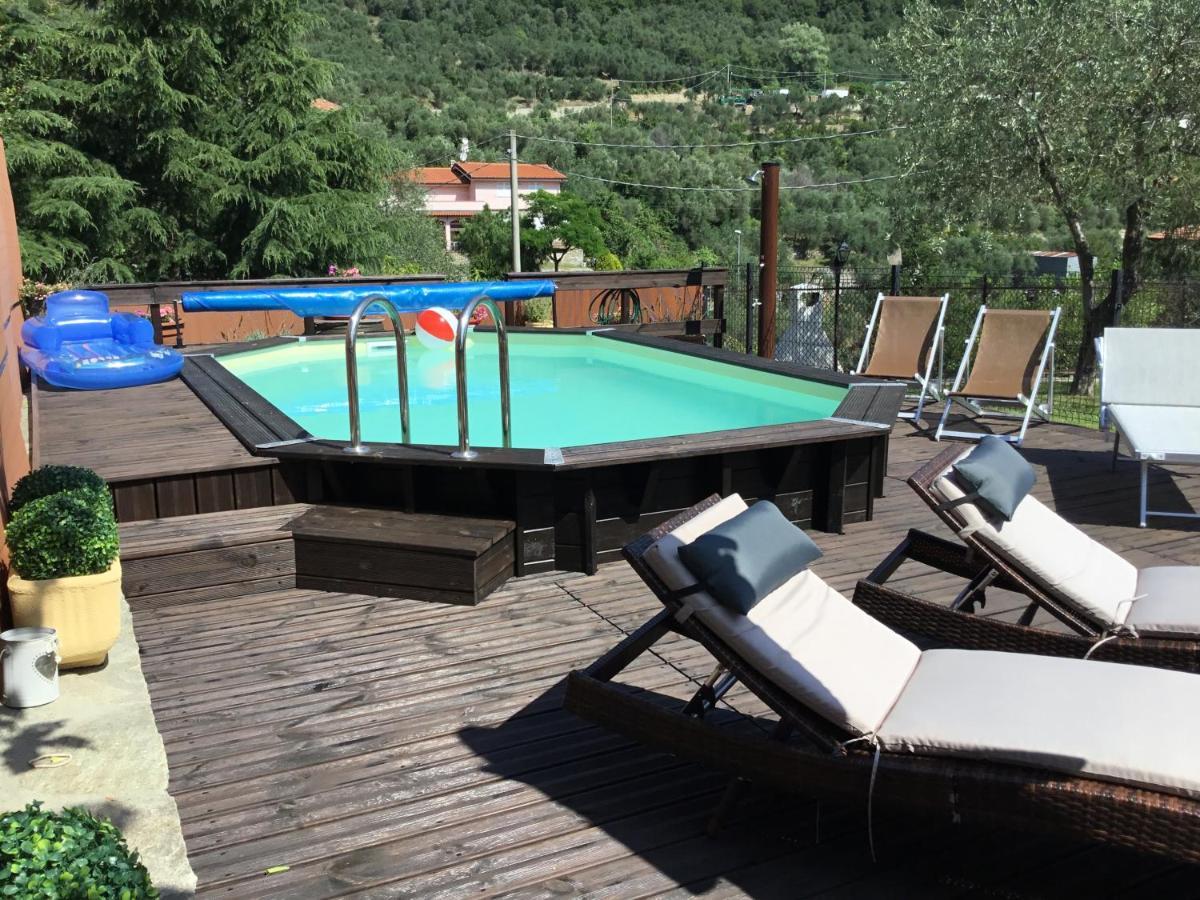 Casa Ginni Con Piscina E Giardino Caravonica Exterior photo
